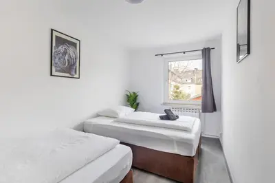 Ein Bett oder Betten in einem Zimmer der Unterkunft 44 Apartments - Modern, Gemütlich, WLAN, Balkon, Stellplatz