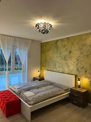 Ein Bett oder Betten in einem Zimmer der Unterkunft Deluxe Apartment Bochum 1 BEDROOM