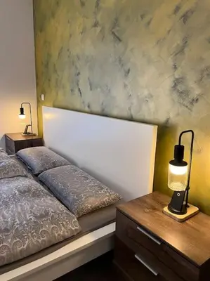 Ein Bett oder Betten in einem Zimmer der Unterkunft Deluxe Apartment Bochum 1 BEDROOM
