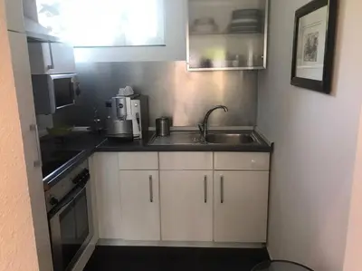 Küche/Küchenzeile in der Unterkunft Modernes, stilvolles 1-Zimmer Wohnung nahe FernUni