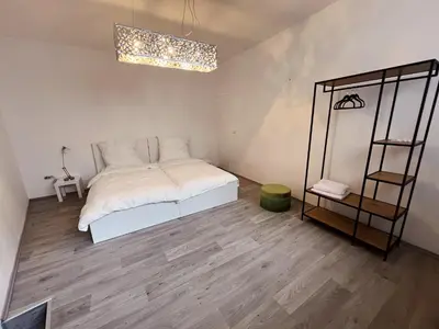 Ein Bett oder Betten in einem Zimmer der Unterkunft Wohngut-Appartement 50qm 2, Zimmer für max 5 Pers inklusive Parkplatz