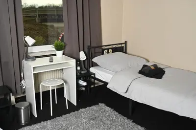 Ein Bett oder Betten in einem Zimmer der Unterkunft Pott Hostel - Essen Steele