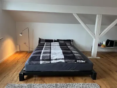 Ein Bett oder Betten in einem Zimmer der Unterkunft Harkort Seeblick 1