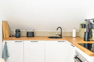 Küche/Küchenzeile in der Unterkunft Soulplace Studioapartment Herten