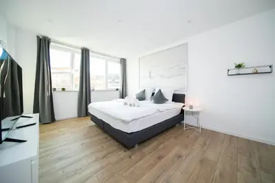 Ein Bett oder Betten in einem Zimmer der Unterkunft Apartment - 3 Bedroom - 6 Person