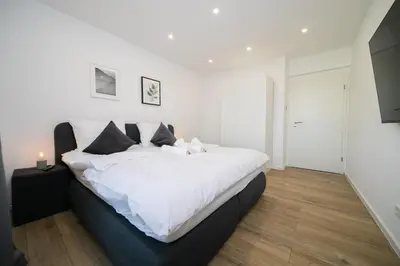 Ein Bett oder Betten in einem Zimmer der Unterkunft Apartment - 3 Bedroom - 6 Person