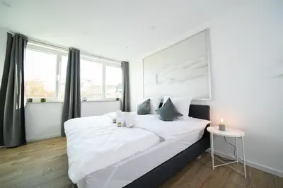 Ein Bett oder Betten in einem Zimmer der Unterkunft Apartment - 3 Bedroom - 6 Person