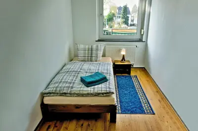 Ein Bett oder Betten in einem Zimmer der Unterkunft Moderne 3 Zimmer Wohnung