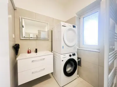 Ein Badezimmer in der Unterkunft Vibehome Düsseldorf - Stadtmitte