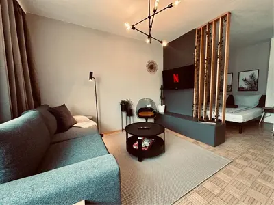 Ein Sitzbereich in der Unterkunft Urban Jungle 4P Studio und Parkplatz
