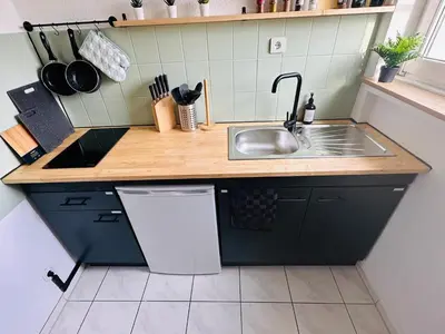 Küche/Küchenzeile in der Unterkunft Urban Jungle 4P Studio und Parkplatz