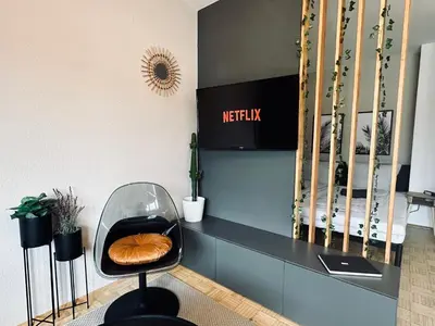 TV/Unterhaltungsangebot in der Unterkunft Urban Jungle 4P Studio und Parkplatz