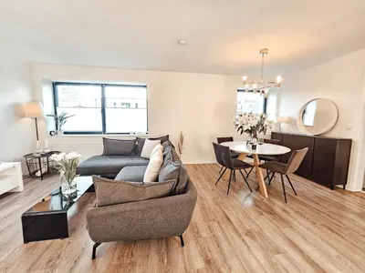Ein Sitzbereich in der Unterkunft Modernes Appartment im Grünen