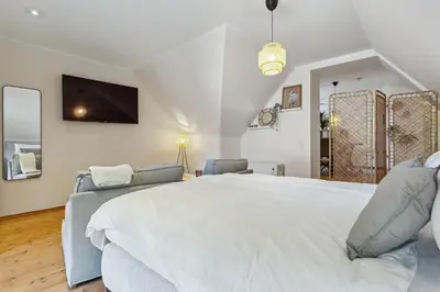 Ein Bett oder Betten in einem Zimmer der Unterkunft Gemütliche Fachwerkwohnung Zentrum Lüdinghausen
