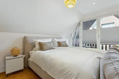 Ein Bett oder Betten in einem Zimmer der Unterkunft Gemütliche Fachwerkwohnung Zentrum Lüdinghausen