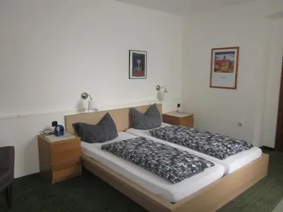 Ein Bett oder Betten in einem Zimmer der Unterkunft Schultenhof