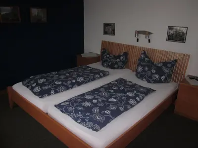 Ein Bett oder Betten in einem Zimmer der Unterkunft Schultenhof