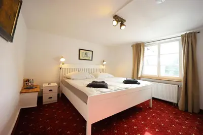 Ein Bett oder Betten in einem Zimmer der Unterkunft THE CORNISH ARMS Guest House