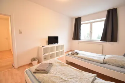 Ein Bett oder Betten in einem Zimmer der Unterkunft CoreRooms - Apartment Bochum Wattenscheid