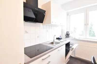 Küche/Küchenzeile in der Unterkunft CoreRooms - Apartment Bochum Wattenscheid