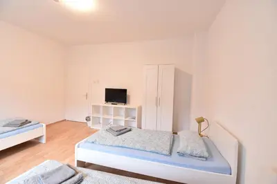 Ein Bett oder Betten in einem Zimmer der Unterkunft CoreRooms - Apartment Bochum Wattenscheid