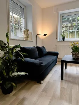 Ein Sitzbereich in der Unterkunft City-Residenz Ge-Buer