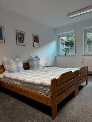Ein Bett oder Betten in einem Zimmer der Unterkunft City-Residenz Ge-Buer