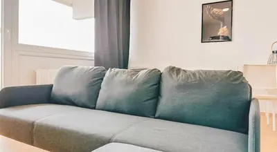 Ein Sitzbereich in der Unterkunft Monteurwohnung mit Balkon und Wohnzimmer
