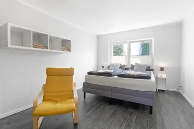 Ein Bett oder Betten in einem Zimmer der Unterkunft 24-7 Living - Modern Apartments in Waltrop with Top Connection