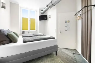 Ein Bett oder Betten in einem Zimmer der Unterkunft 24-7 Living - Modern Apartments in Waltrop with Top Connection