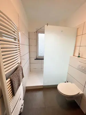 Ein Badezimmer in der Unterkunft Apartment Central 10H 75qm Wi-Fi free Parking