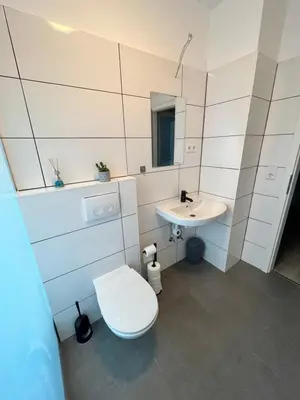 Ein Badezimmer in der Unterkunft Apartment Central 10H 75qm Wi-Fi free Parking