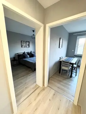 Ein Bett oder Betten in einem Zimmer der Unterkunft Apartment Central 10H 75qm Wi-Fi free Parking