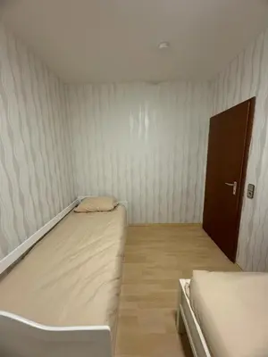 Ein Bett oder Betten in einem Zimmer der Unterkunft HomeStay