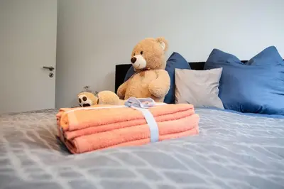 Ein Bett oder Betten in einem Zimmer der Unterkunft Stilvolle Stadtwohnung