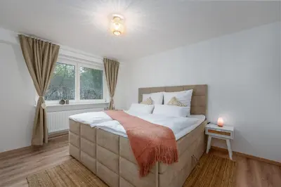 Ein Bett oder Betten in einem Zimmer der Unterkunft Entspannung im Boho-Flair: Sauna & Whirlpool