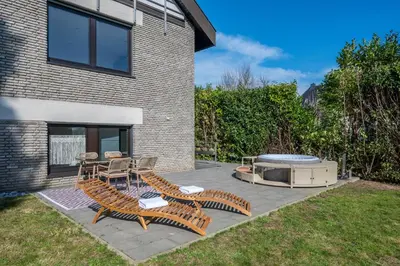 Ein Garten an der Unterkunft Entspannung im Boho-Flair: Sauna & Whirlpool