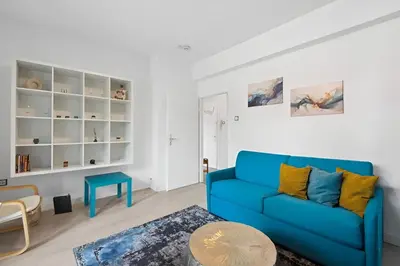 Ein Sitzbereich in der Unterkunft Flora furnished fair apartments