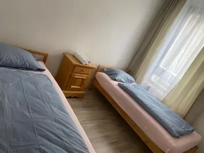 Ein Bett oder Betten in einem Zimmer der Unterkunft Apartment OB
