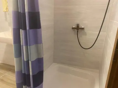 Ein Badezimmer in der Unterkunft Apartment OB