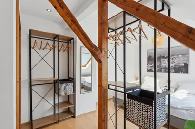 Ein Bett oder Betten in einem Zimmer der Unterkunft Stylish & Relaxing Penthouse ~ Workspace ~ Parking