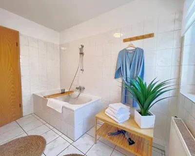 Ein Badezimmer in der Unterkunft TIMELESS APARTMENT: FREE PARKING + BALCONY