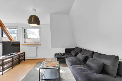 Ein Sitzbereich in der Unterkunft 24-7 Living - Unna Central City Apartments