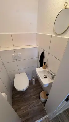 Ein Badezimmer in der Unterkunft 24-7 Living - Unna Central City Apartments