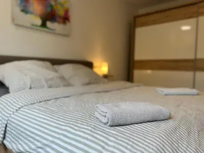 Ein Bett oder Betten in einem Zimmer der Unterkunft Haus mit Wintergarten und Kamin