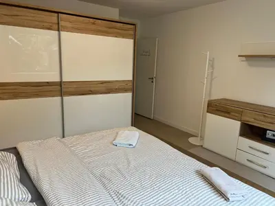 Ein Bett oder Betten in einem Zimmer der Unterkunft Haus mit Wintergarten und Kamin