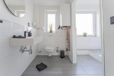Ein Badezimmer in der Unterkunft Zentrales 75qm Apartment Tischfußball & Komfort