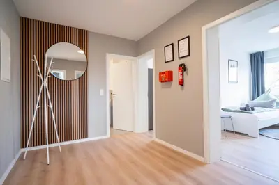 Ein Bett oder Betten in einem Zimmer der Unterkunft Juno - #1 Terrassen-Apartment, Netflix, WLAN