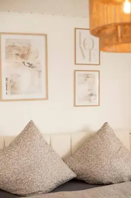 Ein Bett oder Betten in einem Zimmer der Unterkunft DESIGN:Suite am Festspielhaus