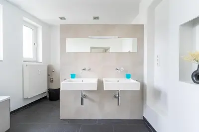 Ein Badezimmer in der Unterkunft Beyond Living® I 235 m² LOFT I Billard I Kamin